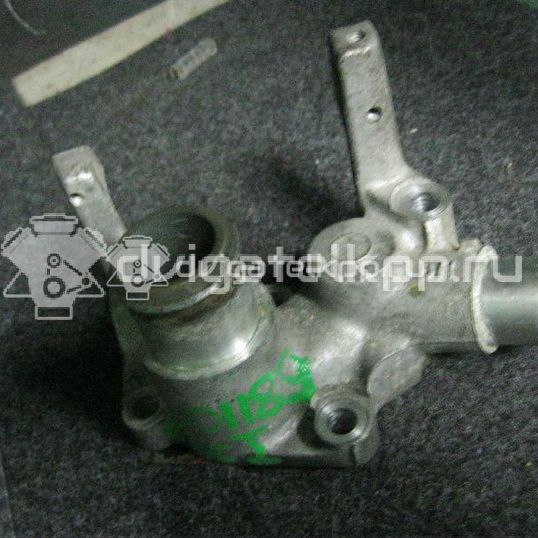 Фото Фланец двигателя системы охлаждения  1301772 для Ford Fiesta / Focus / Puma Ec