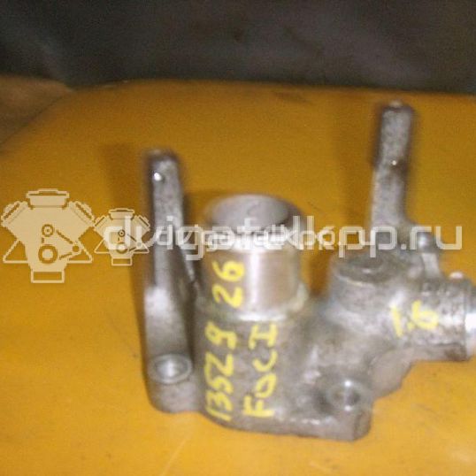 Фото Фланец двигателя системы охлаждения  1301772 для Ford Fiesta / Focus / Puma Ec