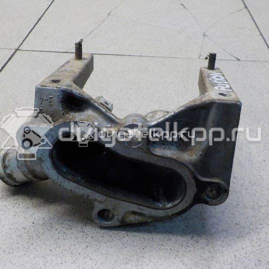 Фото Фланец двигателя системы охлаждения  1221325 для Ford Fiesta / Focus / Puma Ec