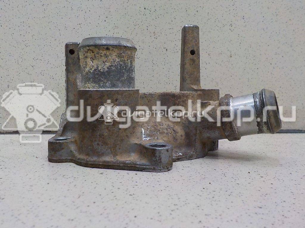 Фото Фланец двигателя системы охлаждения  1221325 для Ford Fiesta / Focus / Puma Ec {forloop.counter}}