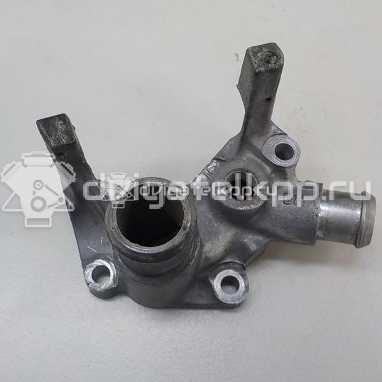 Фото Фланец двигателя системы охлаждения  1221325 для Ford Fiesta / Focus / Puma Ec