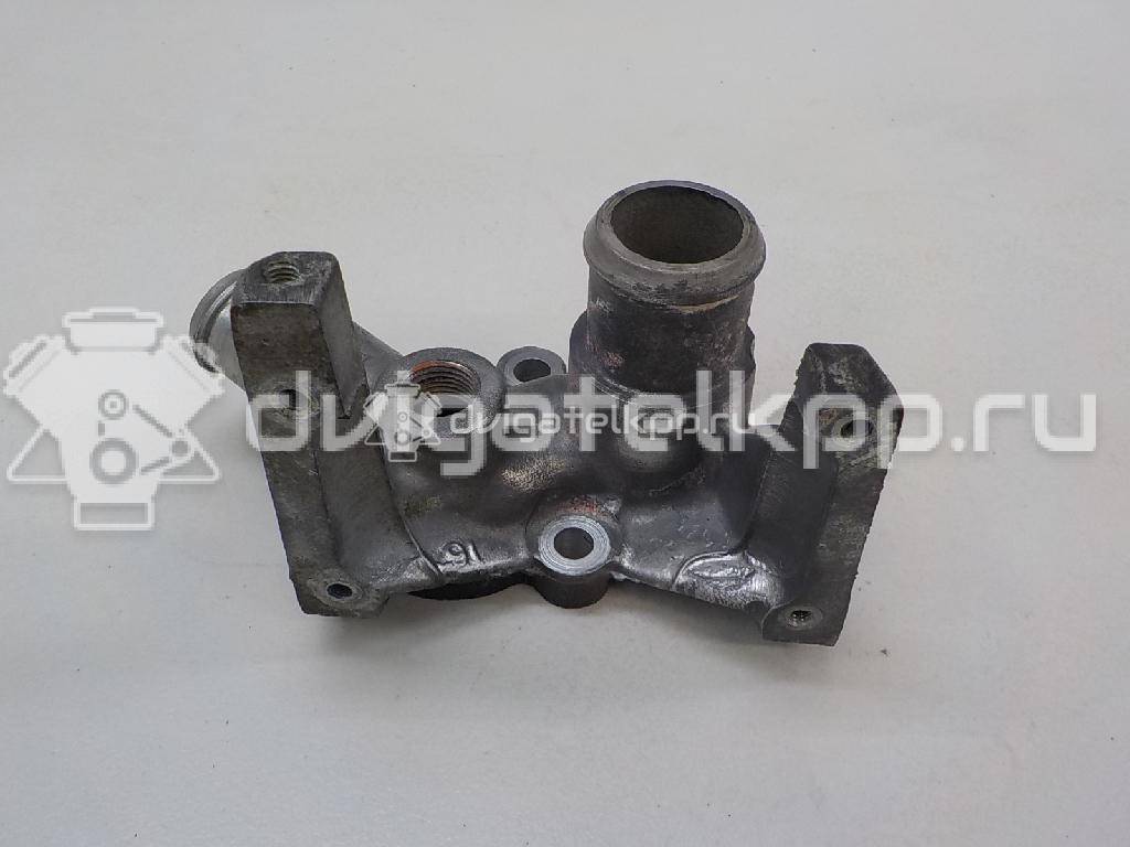 Фото Фланец двигателя системы охлаждения  1221325 для Ford Fiesta / Focus / Puma Ec {forloop.counter}}