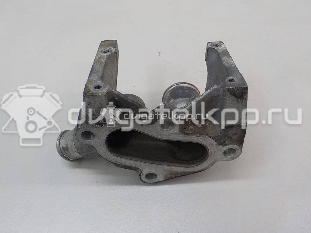 Фото Фланец двигателя системы охлаждения  1221325 для Ford Fiesta / Focus / Puma Ec {forloop.counter}}