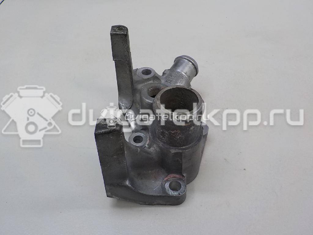 Фото Фланец двигателя системы охлаждения  1221325 для Ford Fiesta / Focus / Puma Ec {forloop.counter}}