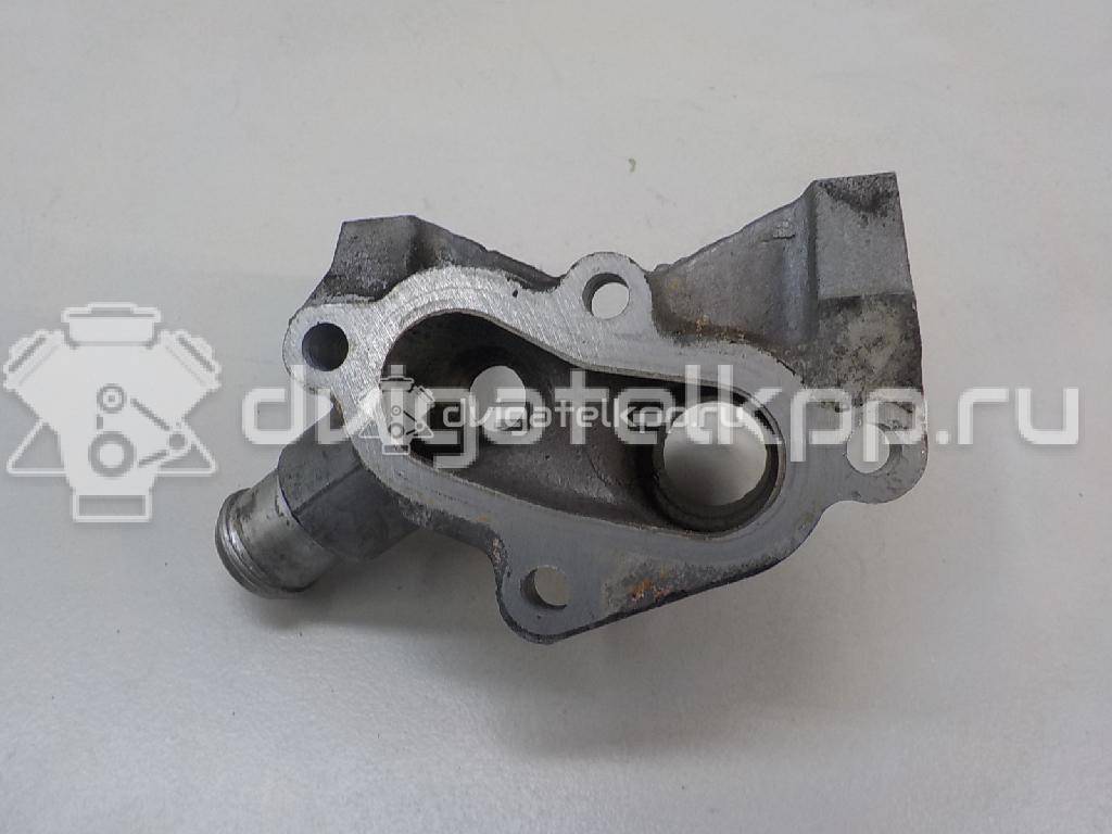 Фото Фланец двигателя системы охлаждения  1221325 для Ford Fiesta / Focus / Puma Ec {forloop.counter}}