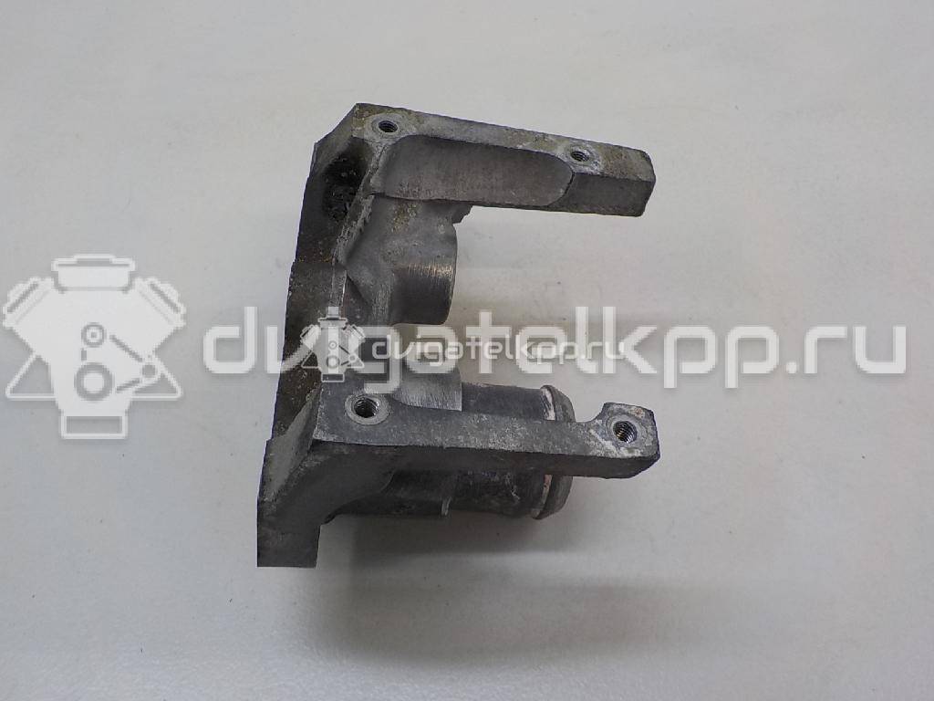 Фото Фланец двигателя системы охлаждения  1221325 для Ford Fiesta / Focus / Puma Ec {forloop.counter}}