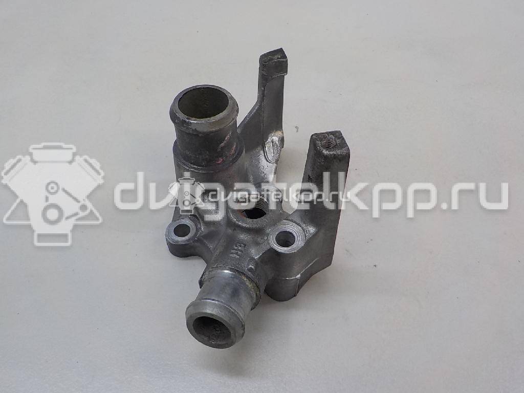 Фото Фланец двигателя системы охлаждения  1221325 для Ford Fiesta / Focus / Puma Ec {forloop.counter}}