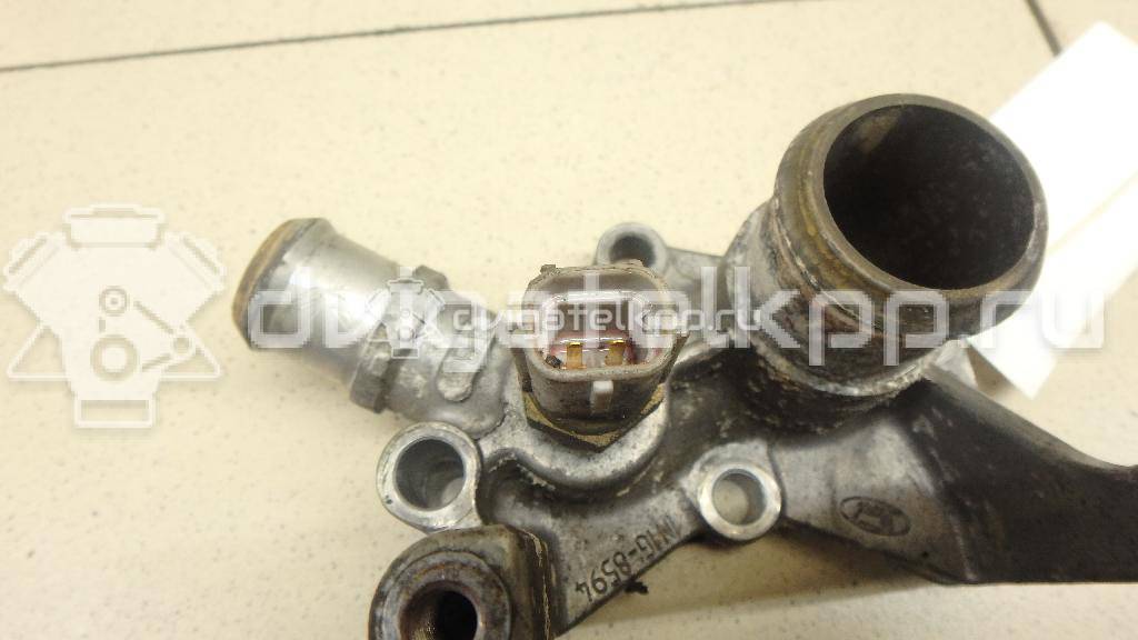 Фото Фланец двигателя системы охлаждения  1221325 для Ford Fiesta / Focus / Puma Ec {forloop.counter}}