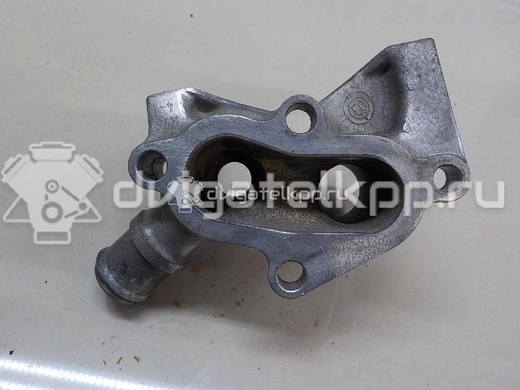 Фото Фланец двигателя системы охлаждения  1221325 для Ford Fiesta / Focus / Puma Ec {forloop.counter}}