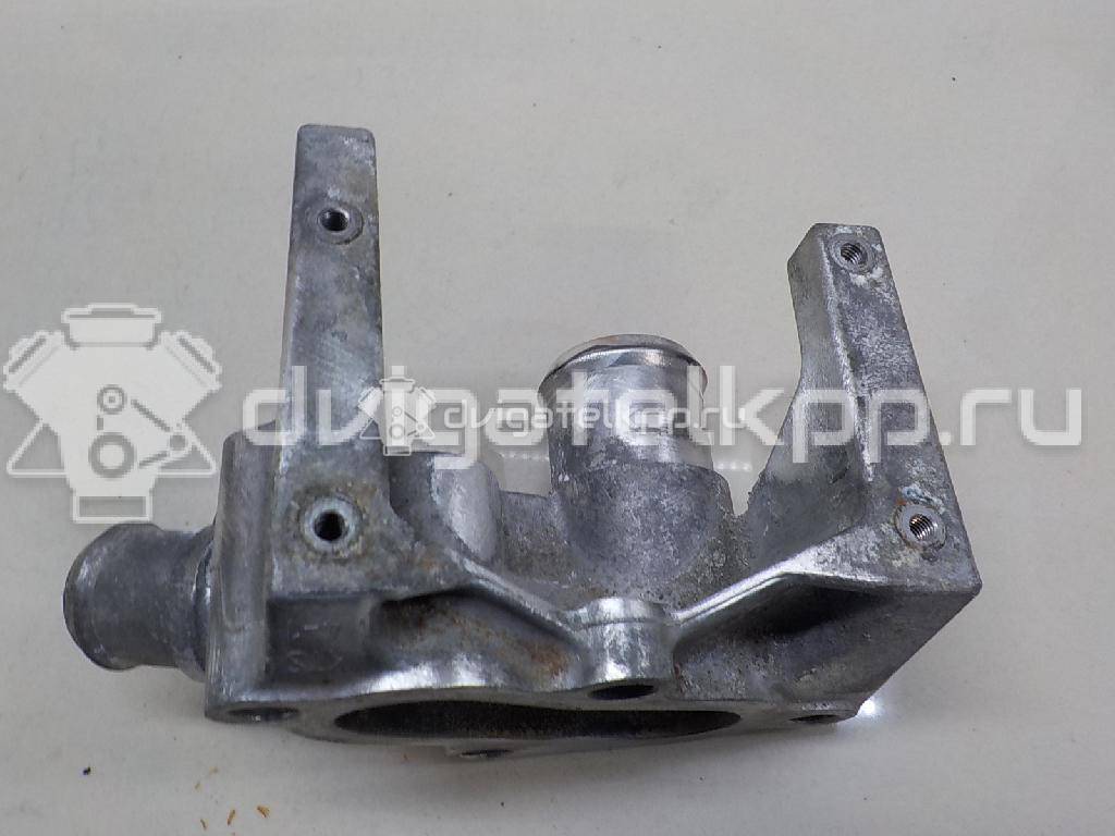 Фото Фланец двигателя системы охлаждения  1221325 для Ford Fiesta / Focus / Puma Ec {forloop.counter}}