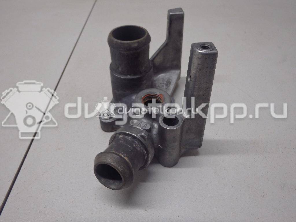 Фото Фланец двигателя системы охлаждения  1221325 для Ford Fiesta / Focus / Puma Ec {forloop.counter}}