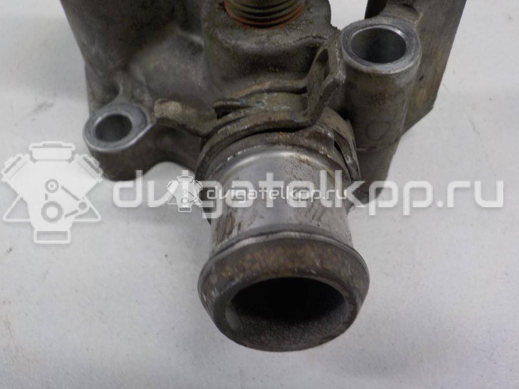 Фото Фланец двигателя системы охлаждения  1221325 для Ford Fiesta / Focus / Puma Ec {forloop.counter}}