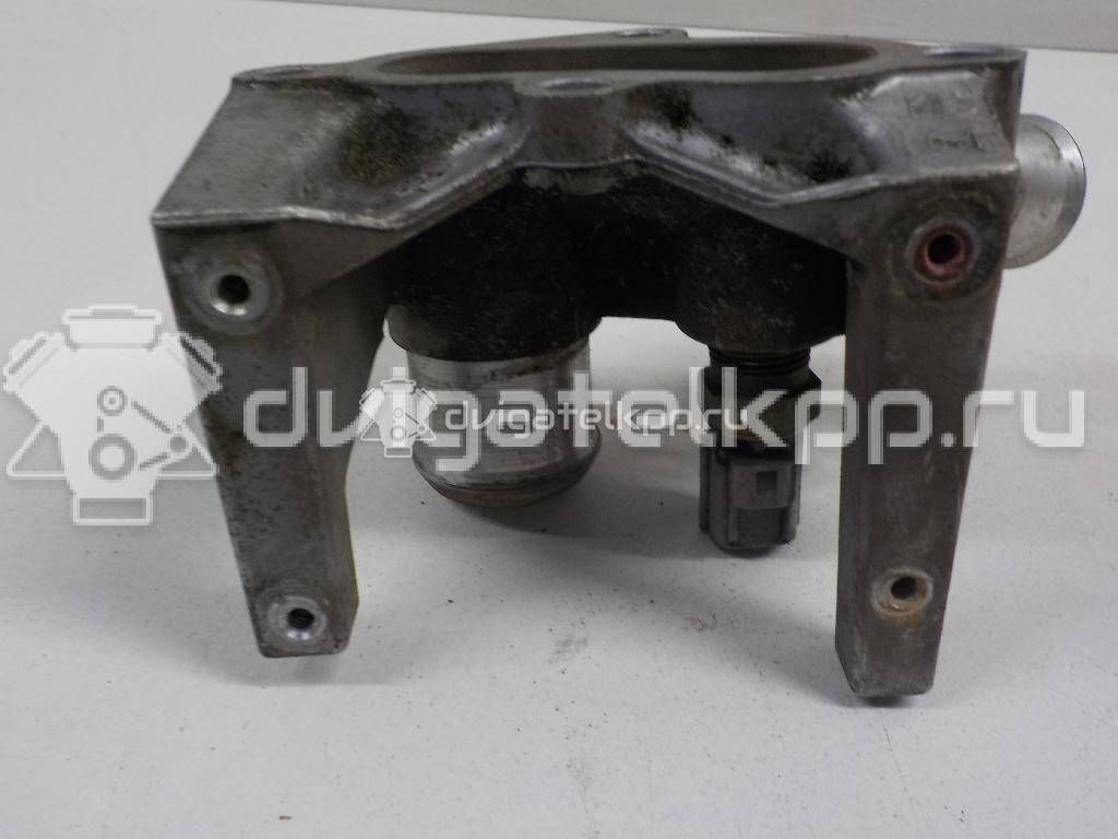 Фото Фланец двигателя системы охлаждения  1221325 для Ford Fiesta / Focus / Puma Ec {forloop.counter}}