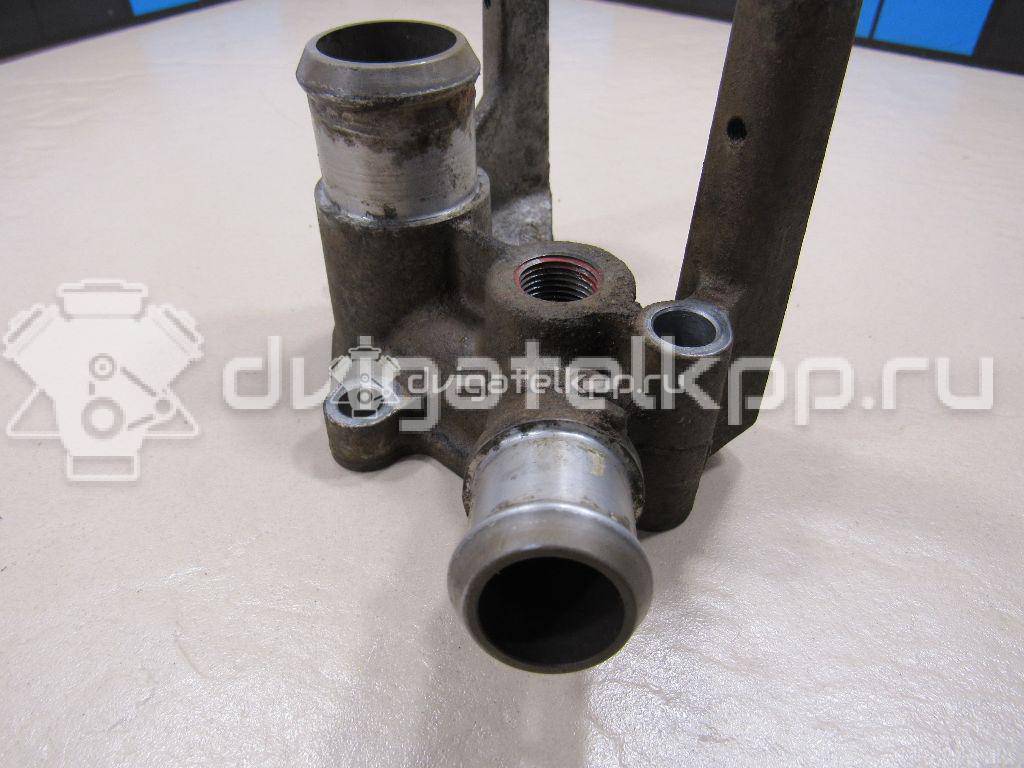 Фото Фланец двигателя системы охлаждения  1221325 для Ford Fiesta / Focus / Puma Ec {forloop.counter}}
