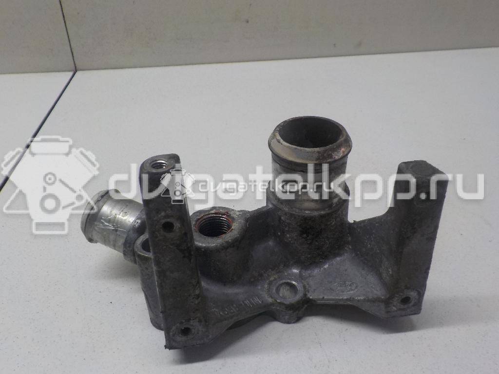Фото Фланец двигателя системы охлаждения  1221325 для Ford Fiesta / Focus / Puma Ec {forloop.counter}}