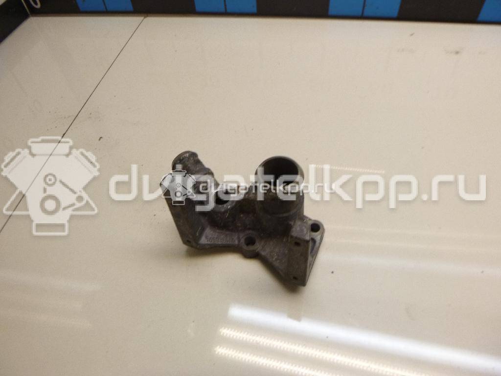 Фото Фланец двигателя системы охлаждения  1221325 для Ford Fiesta / Focus / Puma Ec {forloop.counter}}
