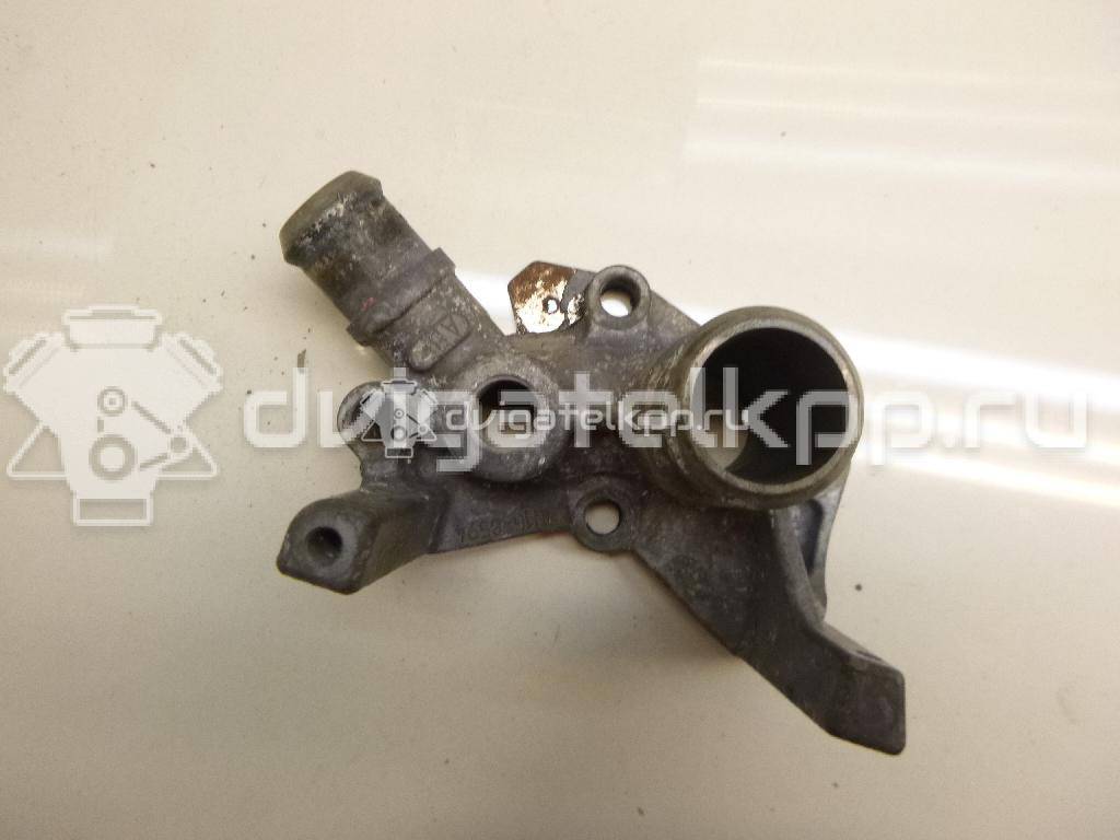 Фото Фланец двигателя системы охлаждения  1221325 для Ford Fiesta / Focus / Puma Ec {forloop.counter}}