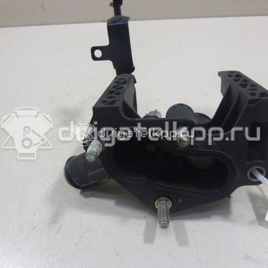 Фото Фланец двигателя системы охлаждения  1221325 для Ford Fiesta / Focus / Puma Ec