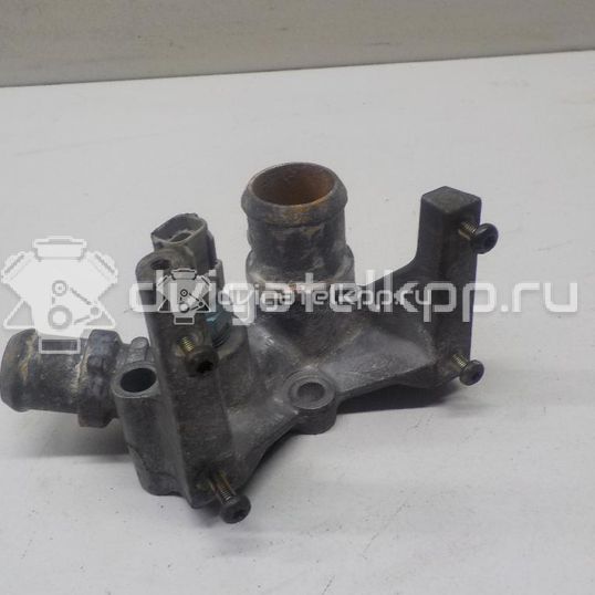 Фото Фланец двигателя системы охлаждения  1221325 для Ford Fiesta / Focus / Puma Ec