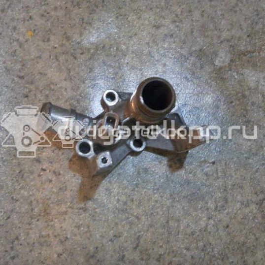 Фото Фланец двигателя системы охлаждения  1221325 для Ford Fiesta / Focus / Puma Ec