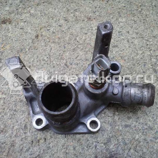 Фото Фланец двигателя системы охлаждения  1221325 для Ford Fiesta / Focus / Puma Ec
