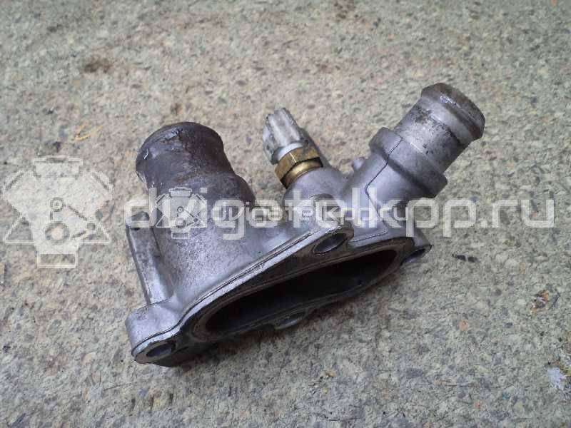 Фото Фланец двигателя системы охлаждения  1221325 для Ford Fiesta / Focus / Puma Ec {forloop.counter}}