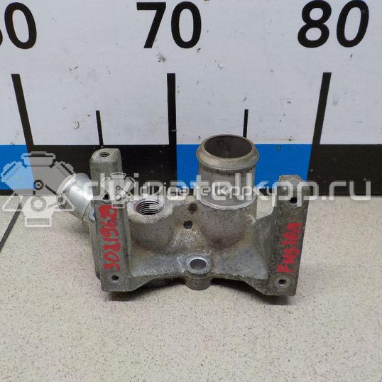 Фото Фланец двигателя системы охлаждения  1221325 для Ford Fiesta / Focus / Puma Ec