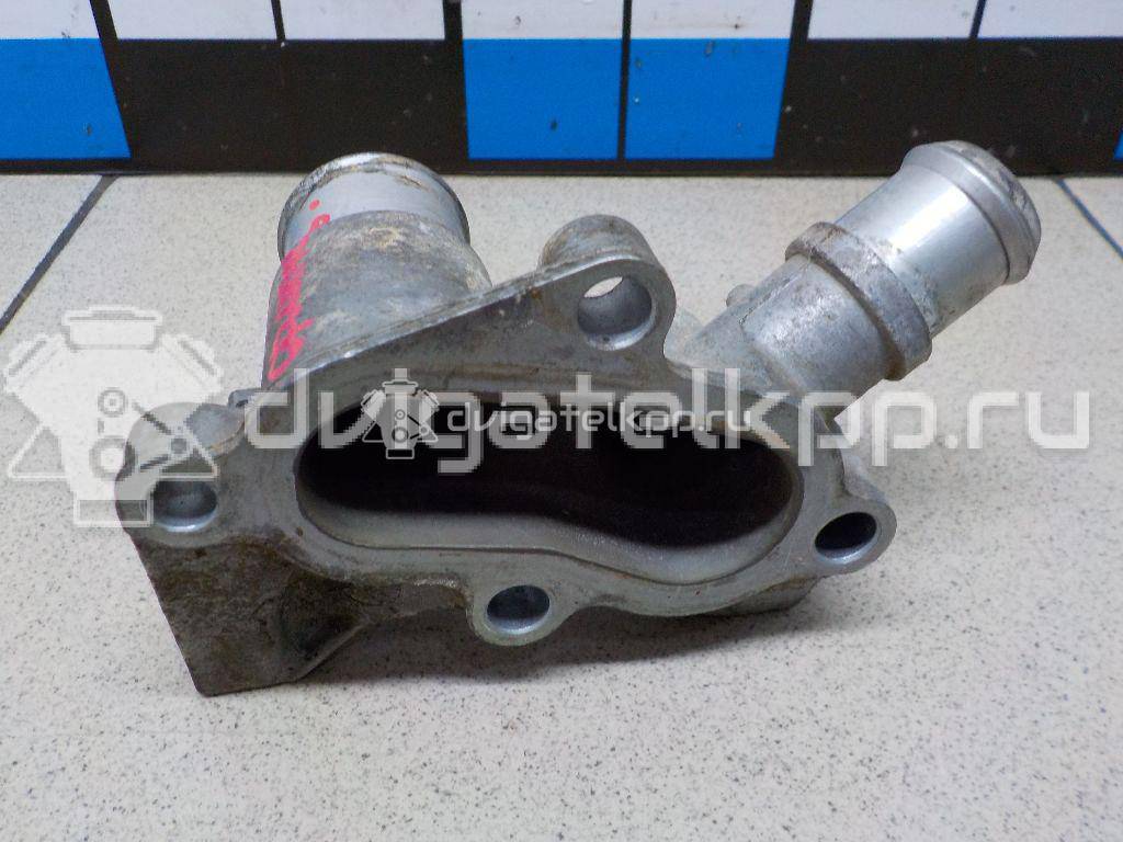 Фото Фланец двигателя системы охлаждения  1221325 для Ford Fiesta / Focus / Puma Ec {forloop.counter}}