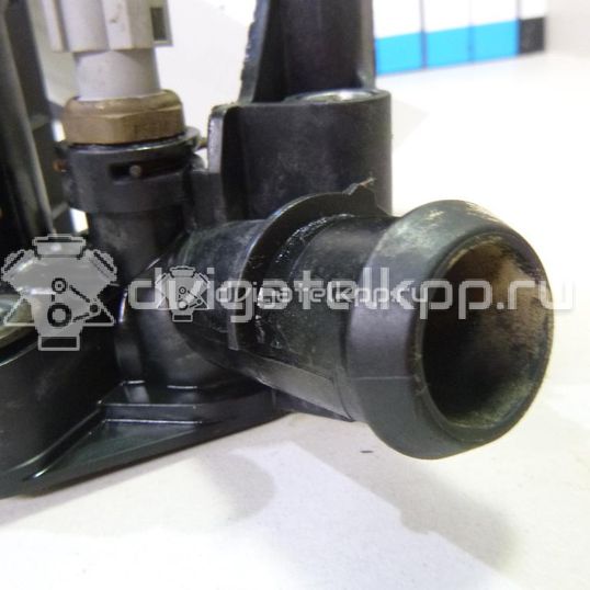 Фото Фланец двигателя системы охлаждения  7M5G8K556AC для Ford Fiesta / Focus / Puma Ec / Fusion Ju