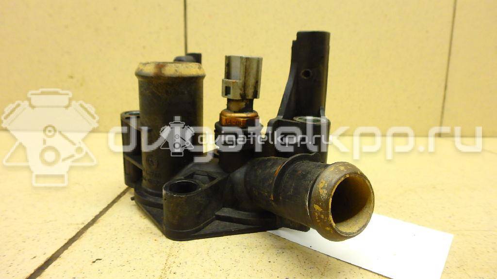 Фото Фланец двигателя системы охлаждения  1531004 для Ford Fiesta / Focus / Puma Ec / Fusion Ju {forloop.counter}}