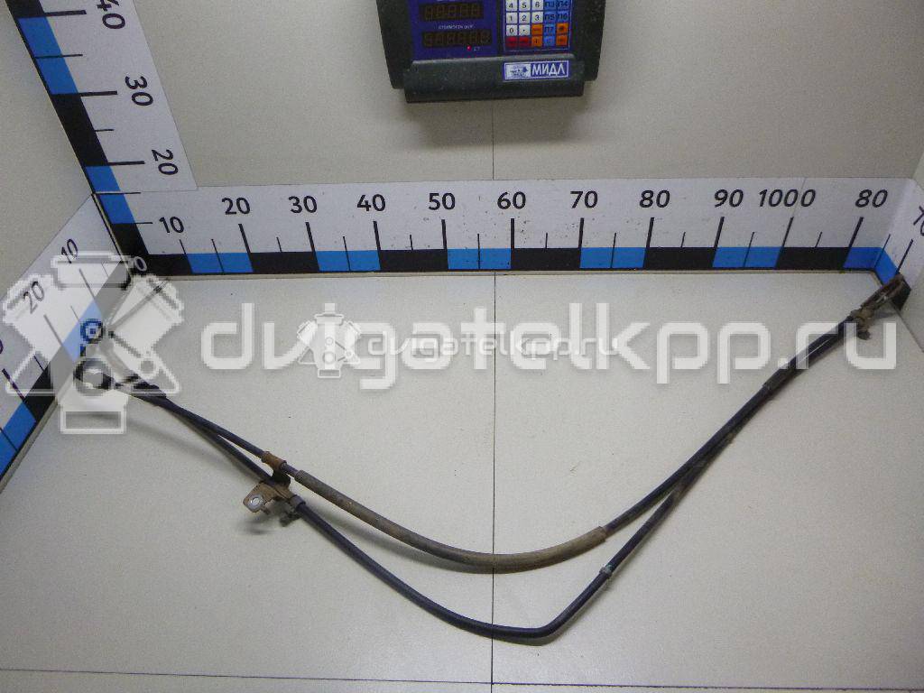 Фото Трос стояночного тормоза  1831613 для Ford Fiesta / B-Max Jk {forloop.counter}}
