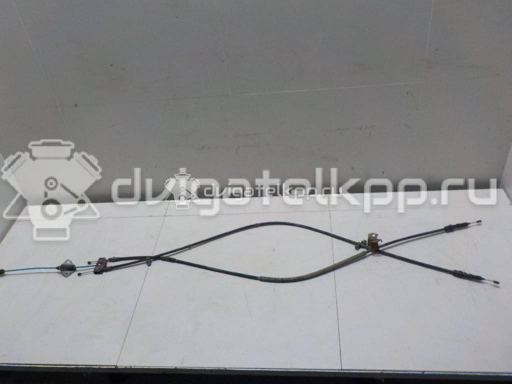 Фото Трос стояночного тормоза  1831613 для Ford Fiesta / B-Max Jk {forloop.counter}}
