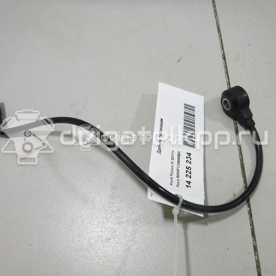 Фото Датчик детонации  98MF12A699BA для Ford Fiesta / Focus / Tourneo / C-Max / Ka