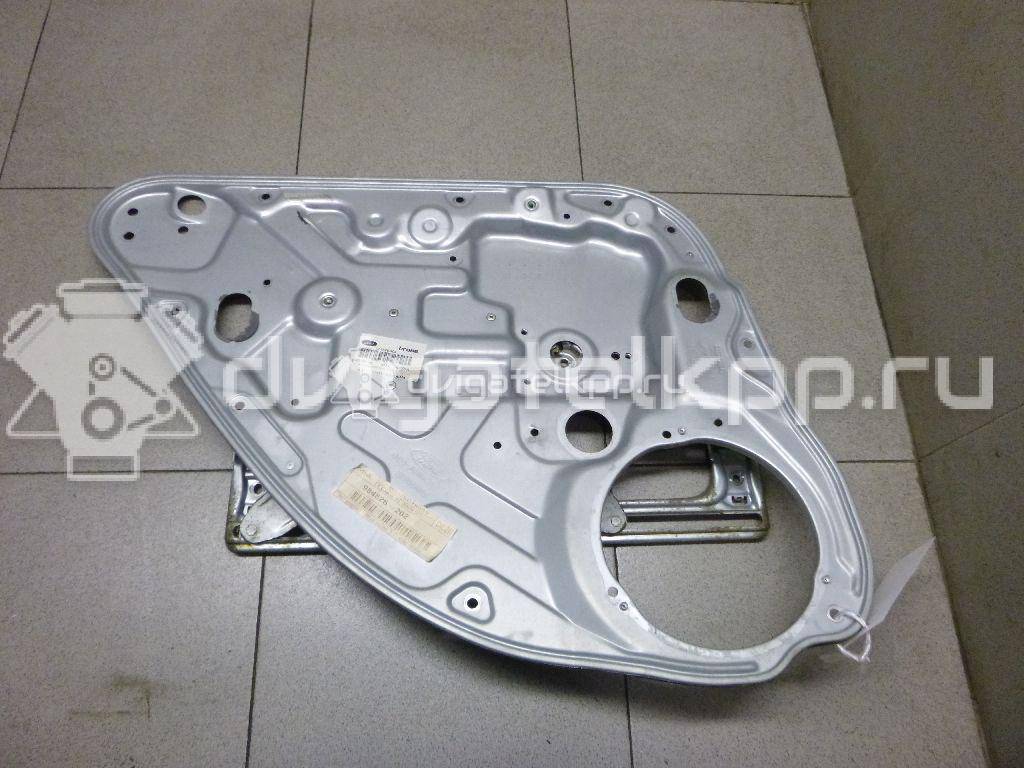 Фото Стеклоподъемник электр. задний левый  1738647 для Ford Focus / Kuga / C-Max / Grand {forloop.counter}}