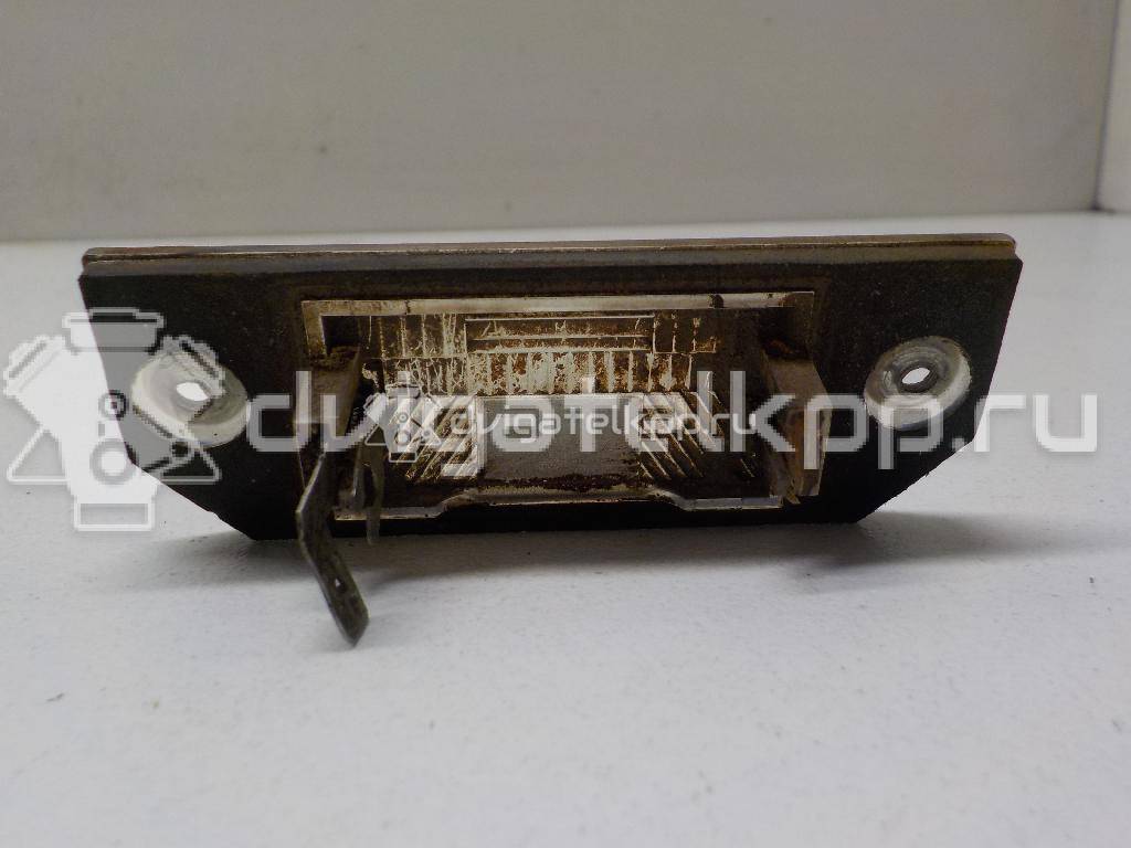 Фото Фонарь подсветки номера  4502331 для Ford Focus / C-Max {forloop.counter}}