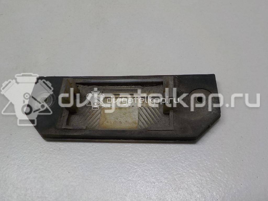 Фото Фонарь подсветки номера  4502331 для Ford Focus / C-Max {forloop.counter}}