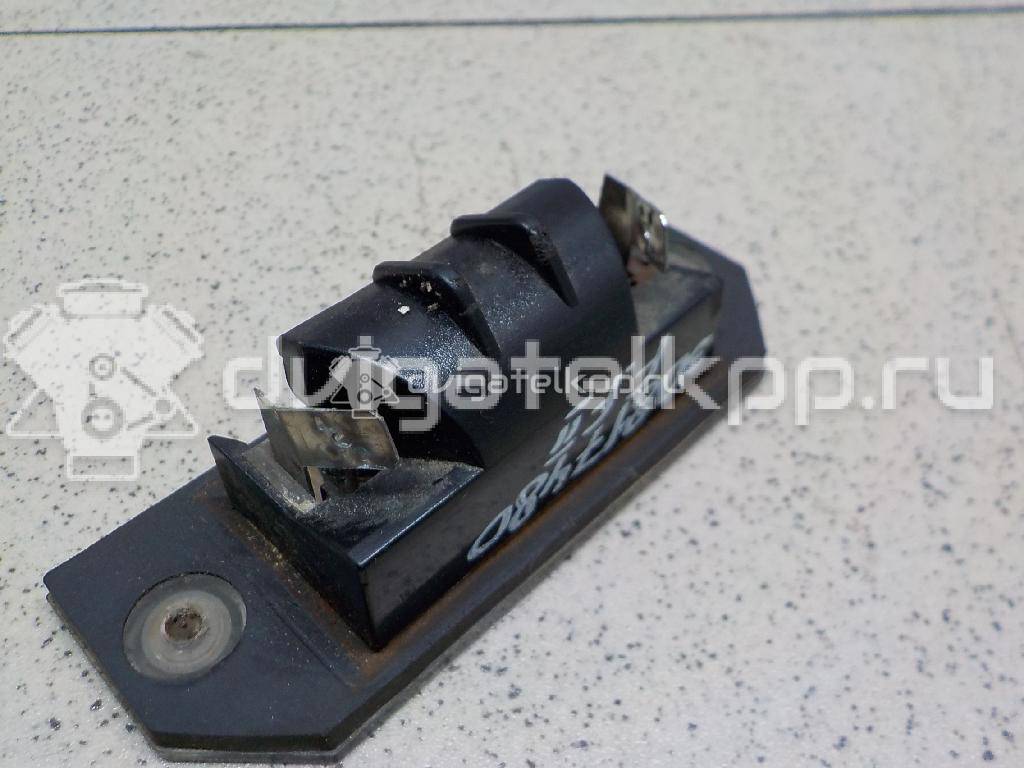Фото Фонарь подсветки номера  4502331 для Ford Focus / C-Max {forloop.counter}}