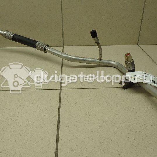 Фото Трубка кондиционера  1741898 для Ford Fiesta / Focus / C-Max / Fusion Ju