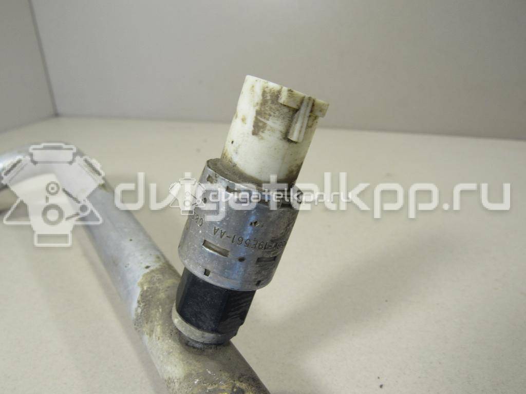 Фото Трубка кондиционера  1741898 для Ford Fiesta / Focus / C-Max / Fusion Ju {forloop.counter}}