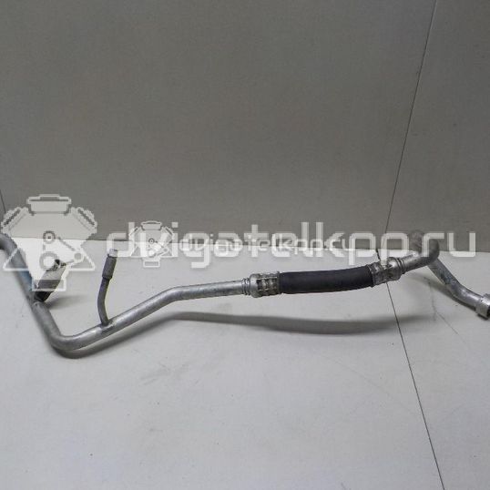 Фото Трубка кондиционера  1741898 для Ford Fiesta / Focus / C-Max / Fusion Ju