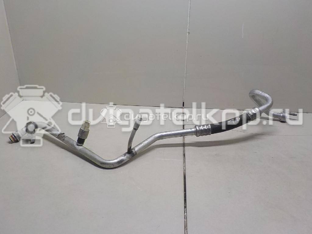 Фото Трубка кондиционера  1741898 для Ford Fiesta / Focus / C-Max / Fusion Ju {forloop.counter}}