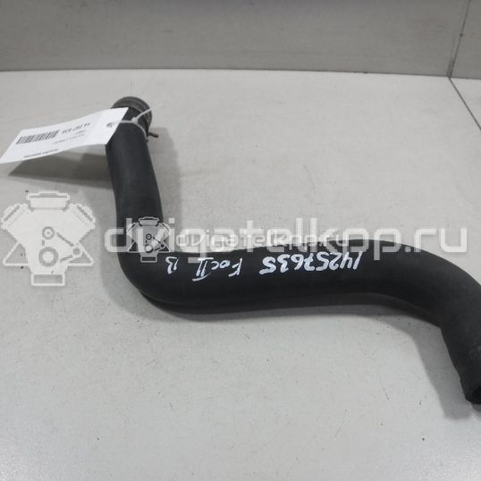 Фото Патрубок радиатора  1490677 для Ford Focus / C-Max