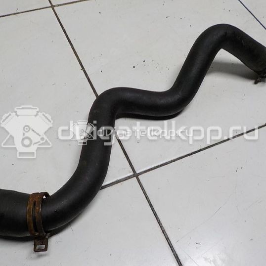 Фото Патрубок радиатора  1386718 для Ford Focus / C-Max