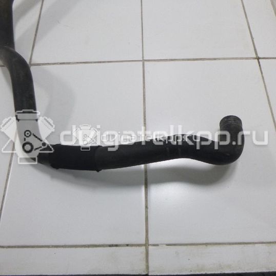 Фото Патрубок радиатора  1454301 для Ford Focus / C-Max