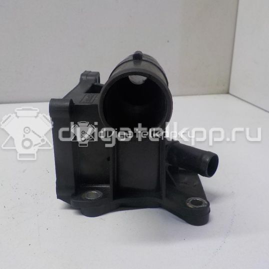 Фото Фланец двигателя системы охлаждения  6G9G8K556AA для Ford Fiesta / Focus / Tourneo / C-Max / Galaxy