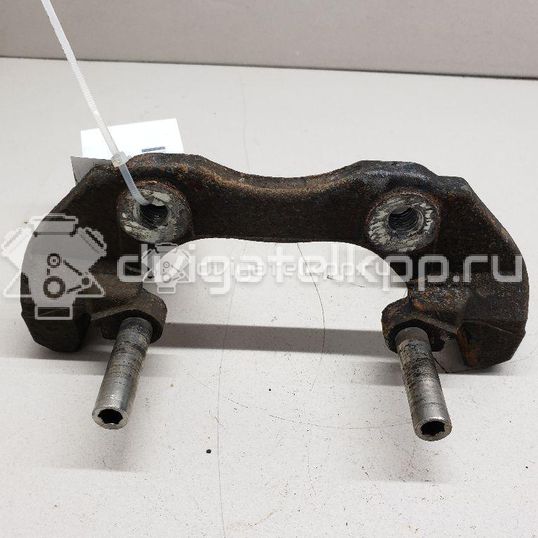 Фото Скоба суппорта переднего  1471710 для Ford Focus / C-Max