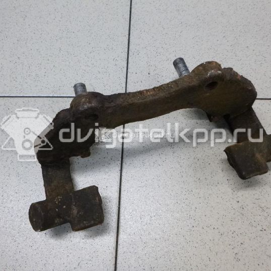 Фото Скоба суппорта переднего  1468864 для Ford Focus / Kuga / C-Max