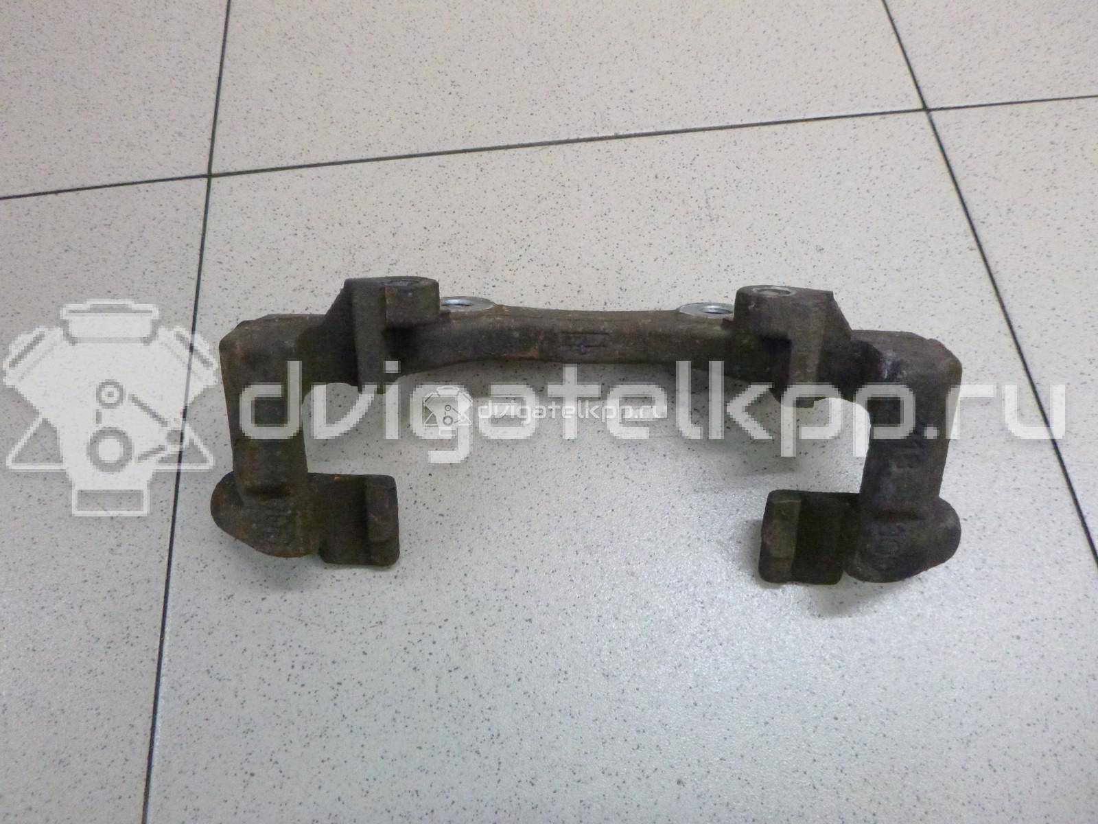 Фото Скоба суппорта переднего  1468864 для Ford Focus / Kuga / C-Max {forloop.counter}}