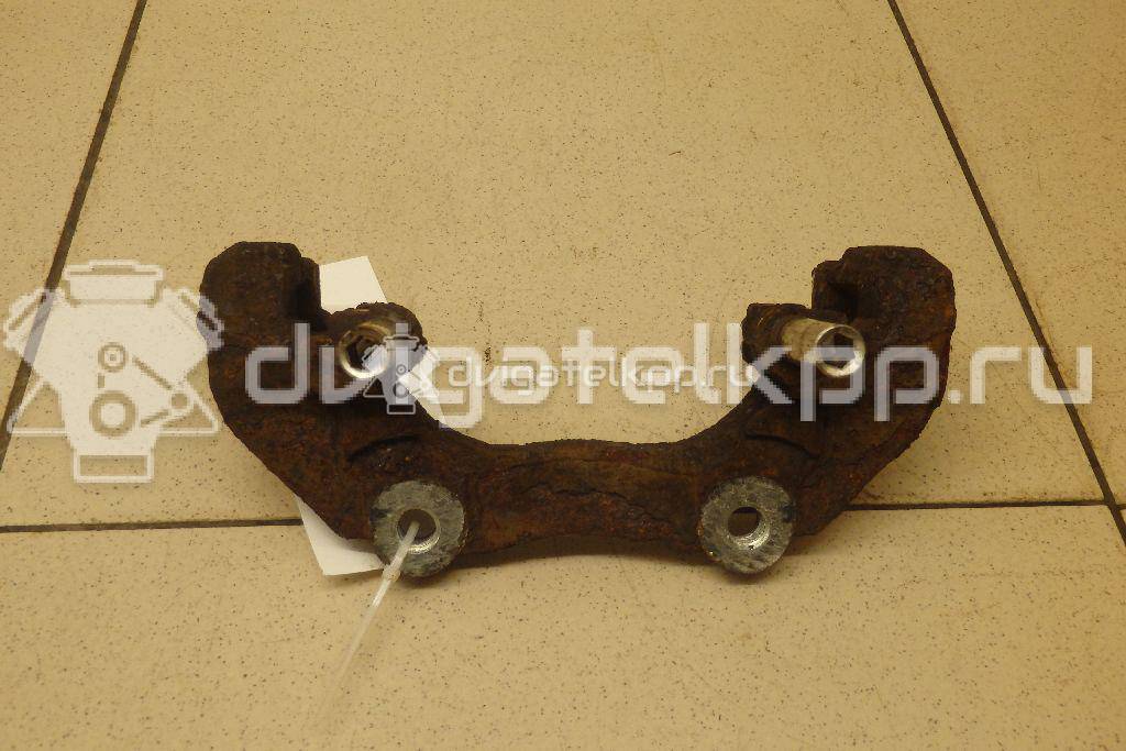 Фото Скоба суппорта переднего  1468864 для Ford Focus / Kuga / C-Max {forloop.counter}}