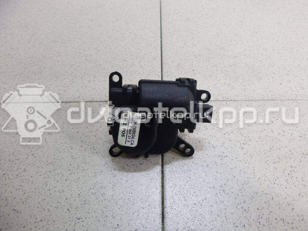Фото Моторчик заслонки отопителя  1S7H19B634CA для Ford Focus / Tourneo / C-Max / Galaxy / Kuga {forloop.counter}}